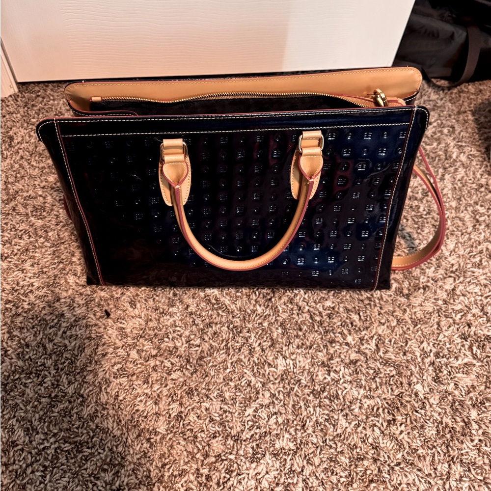 Arcadia blue tote with tan strap & handle and gold hardware.